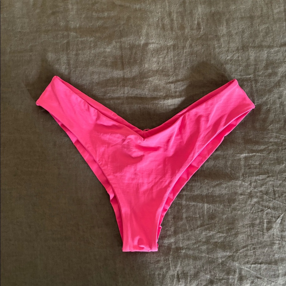 L Space “Ella” pink bikini bottoms in “tanga cut”